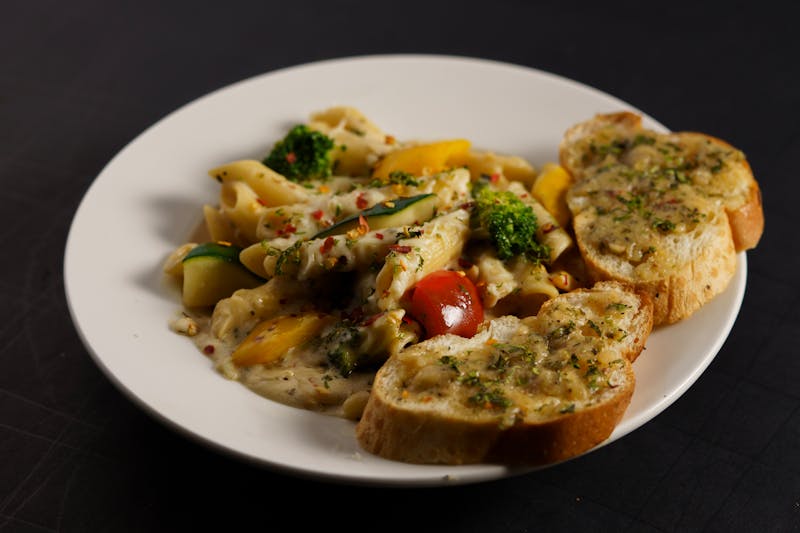 garlic bread with herbs and melted cheese appetizer
